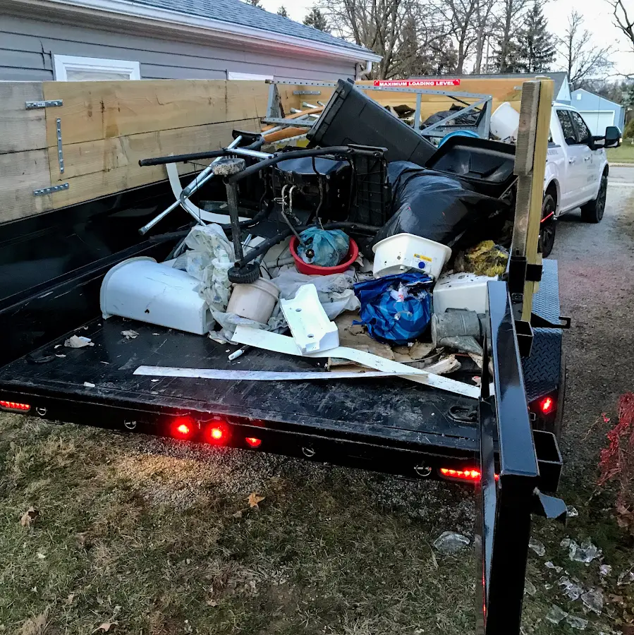 Roll-off dumpster delivered to a residential driveway in Stratford